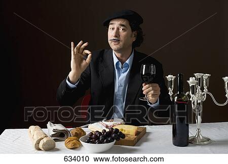 Stereotypical French man with stereotypical French food View Large Photo Image Stock Image - Stereotypical French man with stereotypical French food. Fotosearch