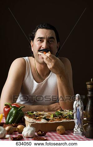 Stock Image - Stereotypical Italian Man eating pizza. Fotosearch