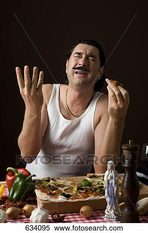 Stereotypical Italian Man eating pizza and gesturing with his hand View Large Photo Image Stock Photography - Stereotypical Italian Man eating pizza and gesturing with his hand. Fotosearch