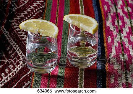 Stereotypical Mexican culture still life, tequila shots View Large Photo Image Stock Photography - Stereotypical Mexican culture still life, tequila shots. Fotosearch