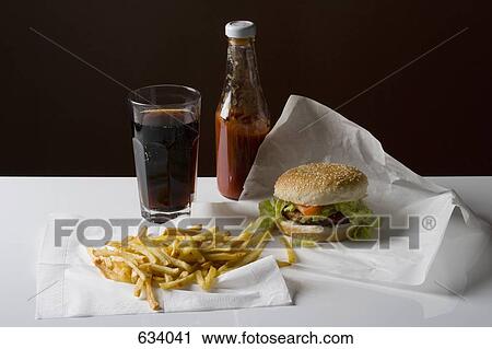Still life of a stereotypical American fast food meal View Large Photo Image Stock Image - Still life of a stereotypical American fast food meal. Fotosearch