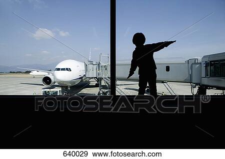 A child imitating an aeroplane View Large Photo Image Stock Photo - A child imitating an aeroplane. Fotosearch