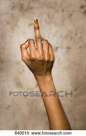 A woman giving an obscene hand gesture View Large Photo Image Stock Photography - A woman giving an obscene hand gesture. Fotosearch