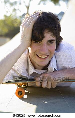 Portrait of a skateboarder View Large Photo Image Stock Photography - Portrait of a skateboarder. Fotosearch
