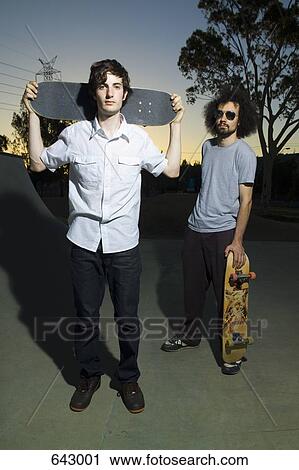 Stock Image - Two skateboarders. Fotosearch