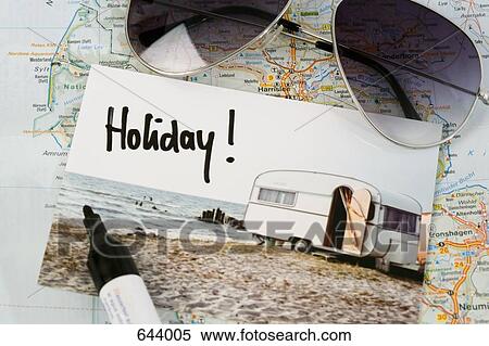 A map, sunglasses, and a postcard View Large Photo Image Stock Photography - A map, sunglasses, and a postcard. Fotosearch