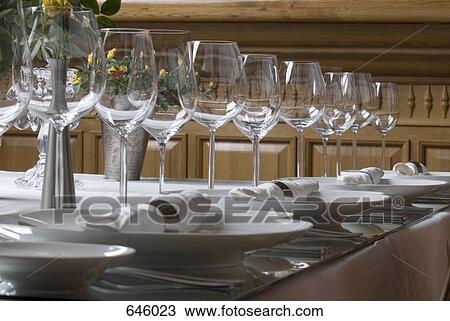 An elegantly set dining table, close up View Large Photo Image Stock Image - An elegantly set dining table, close up. Fotosearch
