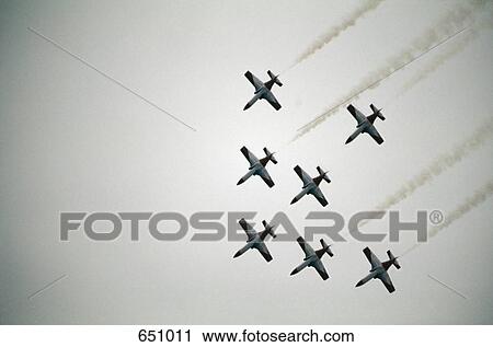 Medium Group of Military Airplanes flying in formation, Austria View Large Photo Image Stock Image - Medium Group of Military Airplanes flying in formation, Austria. Fotosearch