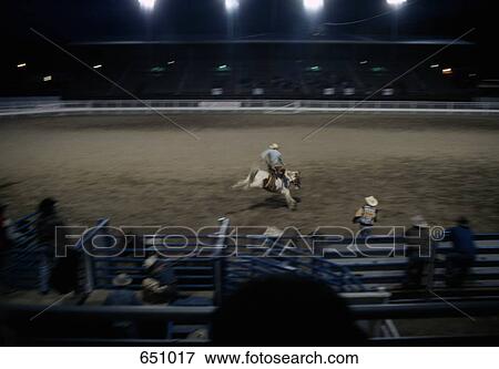 rodeo rider performing at a rodeo, Cody, Wyoming, USA View Large Photo Image Stock Photo - rodeo rider performing at a rodeo, Cody, Wyoming, USA. Fotosearch