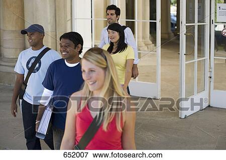 Stock Photo - University students leaving a classroom building on campus. Fotosearch