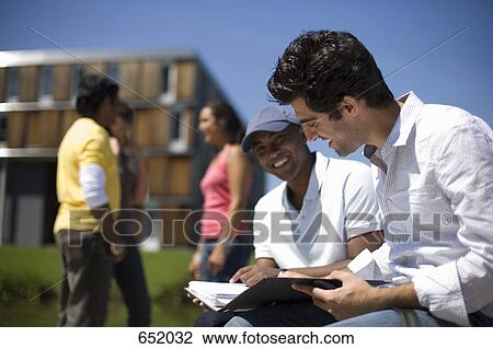 University students studying on campus View Large Photo Image Stock Image - University students studying on campus. Fotosearch