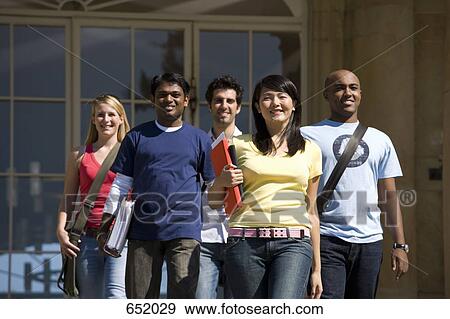 University students walking on campus View Large Photo Image Stock Photo - University students walking on campus. Fotosearch