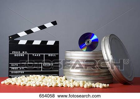 Stock Photo - Clapperboard, popcorn, film reels and CD. Fotosearch