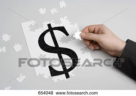 Dollar sign jigsaw puzzle View Large Photo Image Stock Photo - Dollar sign jigsaw puzzle. Fotosearch