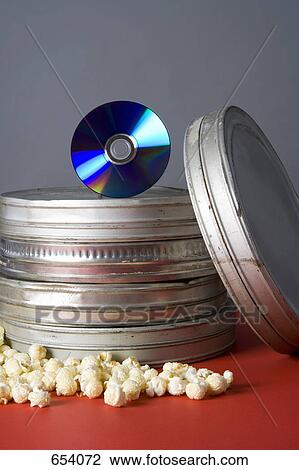 Film reels, popcorn and a CD-Rom View Large Photo Image Stock Image - Film reels, popcorn and a CD-Rom. Fotosearch