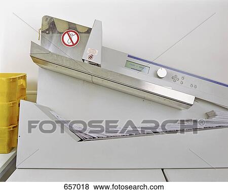 A sorting machine in a mailroom View Large Photo Image Stock Photo - A sorting machine in a mailroom. Fotosearch