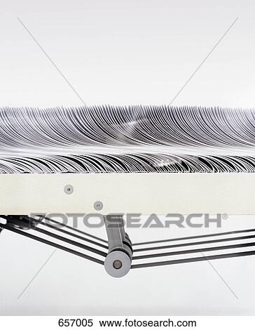 Paper on a sorting machine View Large Photo Image Stock Photography - Paper on a sorting machine. Fotosearch