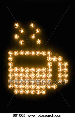 Stock Photography - Coffee cup symbol made with illuminated light bulbs. Fotosearch
