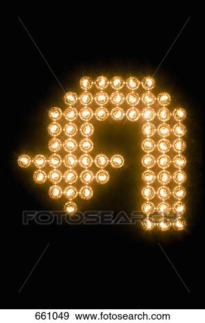 Stock Photo - U-turn symbol made with illuminated light bulbs. Fotosearch