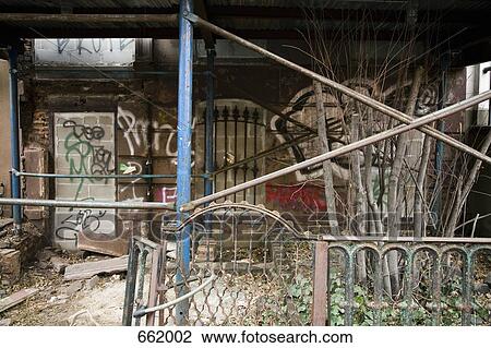 A derelict building and front yard View Large Photo Image Stock Image - A derelict building and front yard. Fotosearch