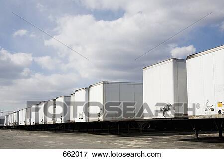 Stock Photo - Cargo containers from articulated lorries. Fotosearch