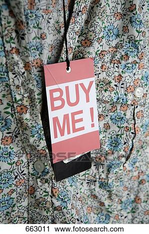 ‘Buy Me! ’ price tag hanging from a lady’s blouse View Large Photo Image Stock Image - ‘Buy Me! ’ price tag hanging from a lady’s blouse. Fotosearch