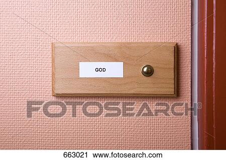 Stock Image - ‘God’ name sticker next to doorbell. Fotosearch