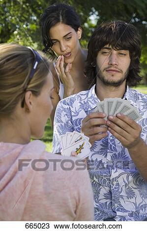 Friends playing cards View Large Photo Image Stock Image - Friends playing cards. Fotosearch