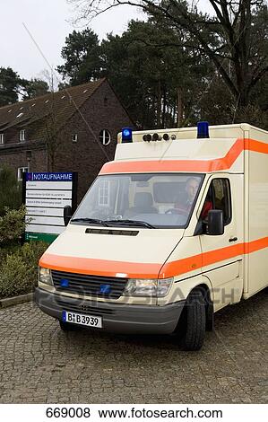 An ambulance arriving at a hospital View Large Photo Image Stock Photo - An ambulance arriving at a hospital. Fotosearch