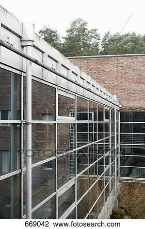 Glass facade of a building View Large Photo Image Stock Image - Glass facade of a building. Fotosearch