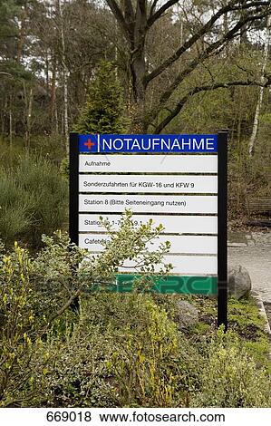 Stock Photo - Information sign at a hospital, Berlin, Germany. Fotosearch