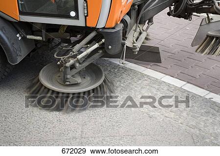 A street cleaning machine View Large Photo Image Stock Photo - A street cleaning machine. Fotosearch