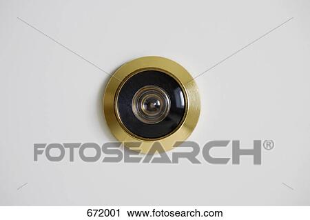 Close-up of a door peephole View Large Photo Image Stock Image - Close-up of a door peephole. Fotosearch