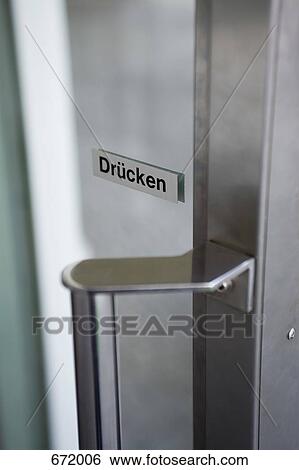 Close-up of a door with ‘push’ written in German on it View Large Photo Image Stock Photograph - Close-up of a door with ‘push’ written in German on it. Fotosearch