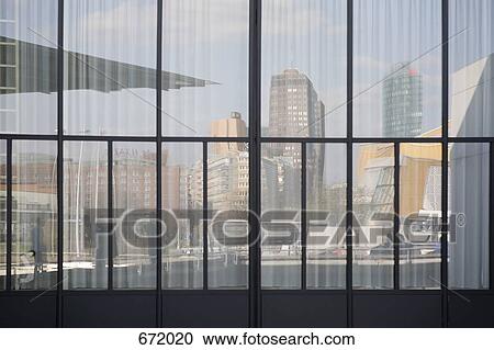 Reflection in office build of Potsdamer Platz, Berlin, Germany View Large Photo Image Stock Image - Reflection in office build of Potsdamer Platz, Berlin, Germany. Fotosearch