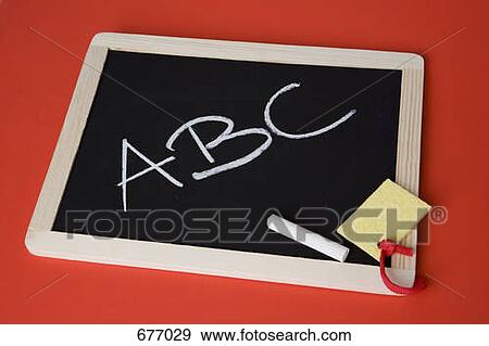 Stock Photo - A chalkboard with 'ABC' written on it. Fotosearch