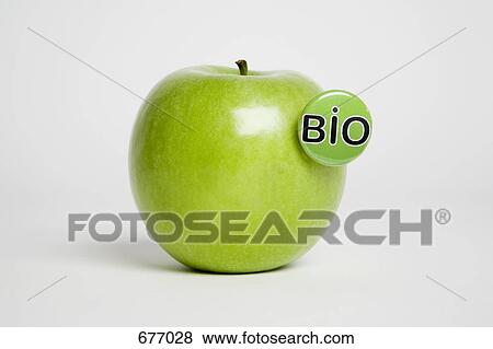 A green apple with a 'Bio' button in it View Large Photo Image Stock Photo - A green apple with a 'Bio' button in it. Fotosearch