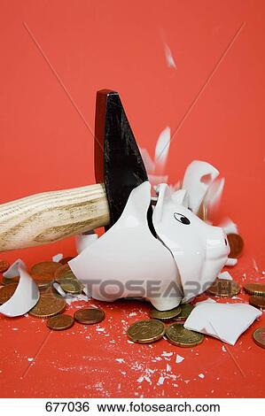 A hammer smashing a piggy bank View Large Photo Image Stock Photograph - A hammer smashing a piggy bank. Fotosearch
