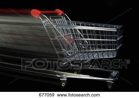 A miniature empty shopping cart moving, blurred motion View Large Photo Image Stock Photo - A miniature empty shopping cart moving, blurred motion. Fotosearch