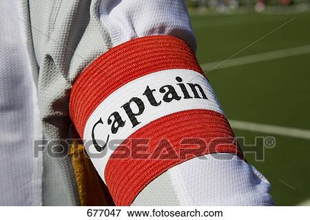 A person wearing a 'captain' arm band View Large Photo Image Stock Photo - A person wearing a 'captain' arm band. Fotosearch