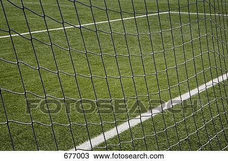 The net of a soccer goal, close up, and a soccer field View Large Photo Image Stock Image - The net of a soccer goal, close up, and a soccer field. Fotosearch