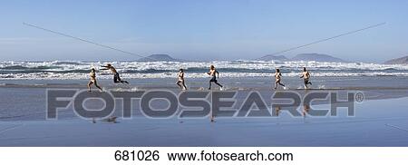 People running along a beach View Large Photo Image Stock Photograph - People running along a beach. Fotosearch