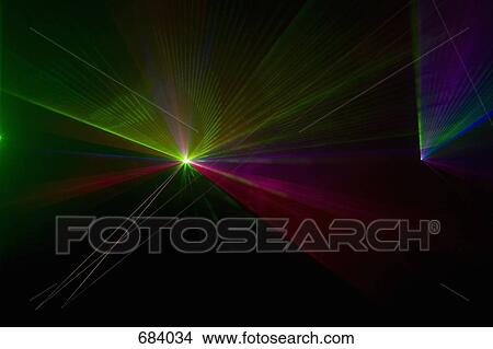 Multi colored laser lights View Large Photo Image Picture - Multi colored laser lights. Fotosearch