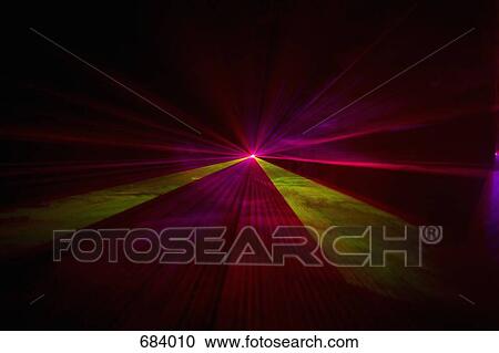 Stock Image - Multi colored laser lights. Fotosearch