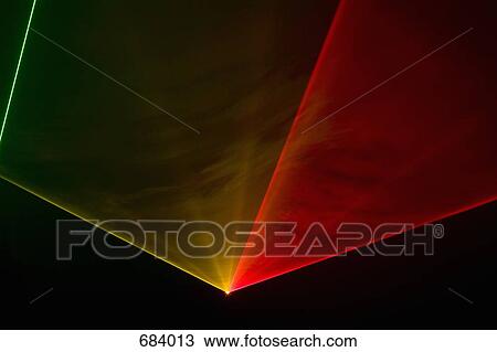 Stock Image - Multi colored laser lights. Fotosearch