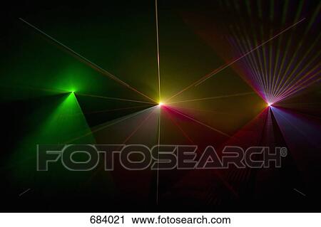 Stock Image - Multi colored laser lights. Fotosearch