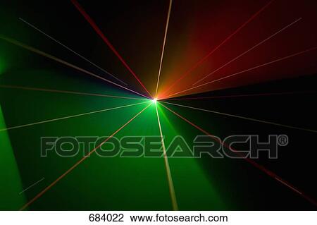 Stock Image - Multi colored laser lights. Fotosearch