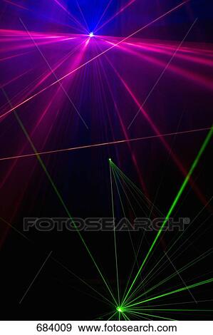 Multi colored laser lights View Large Photo Image Stock Photo - Multi colored laser lights. Fotosearch