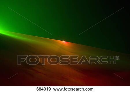 Stock Photo - Multi colored laser lights. Fotosearch