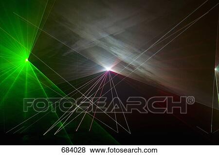 Multi colored laser lights View Large Photo Image Stock Photo - Multi colored laser lights. Fotosearch